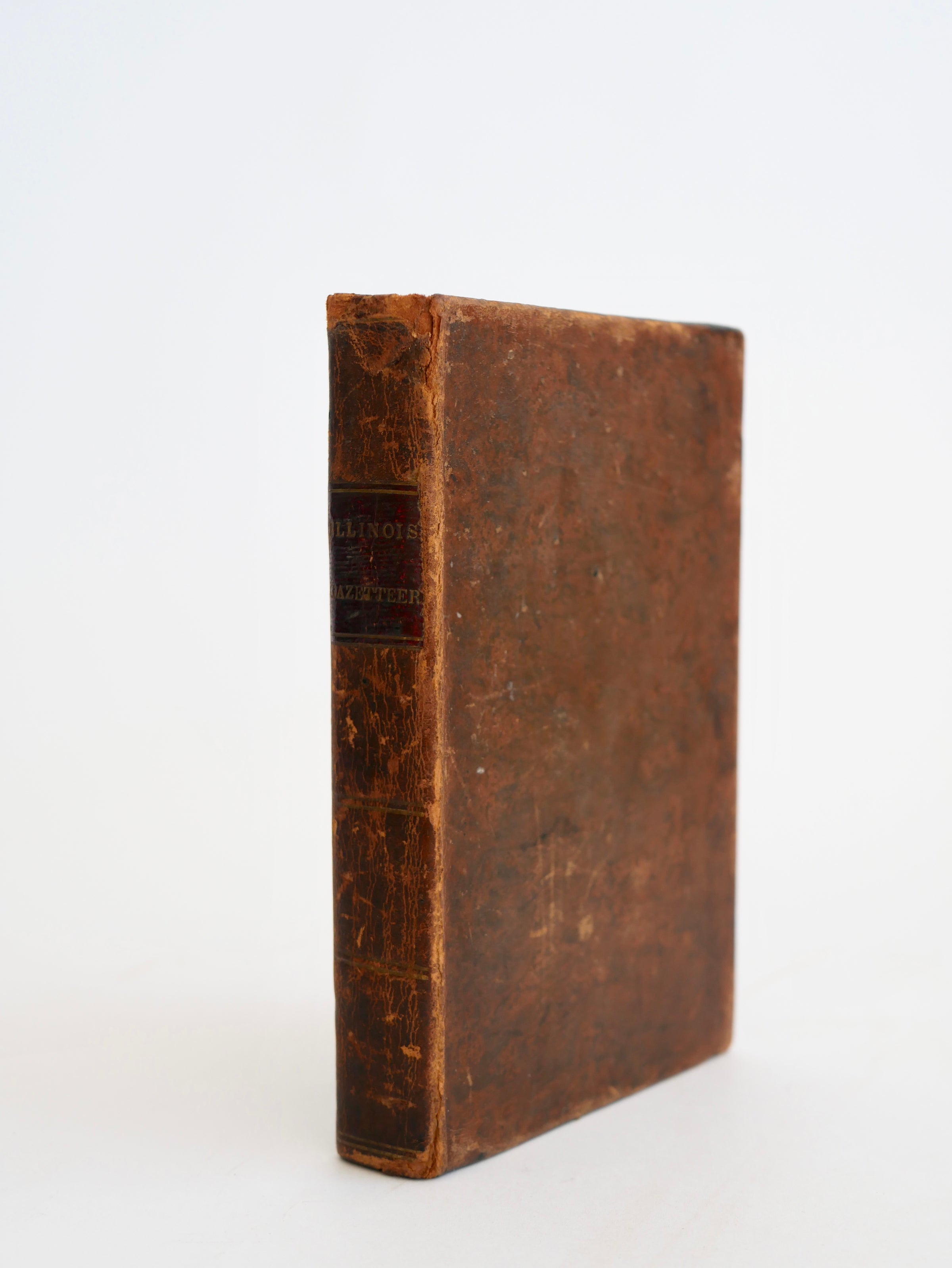 A cornerstone of Illinois frontier Americana — the first edition, in period tree calf, with a contemporary owner's signature of 1834