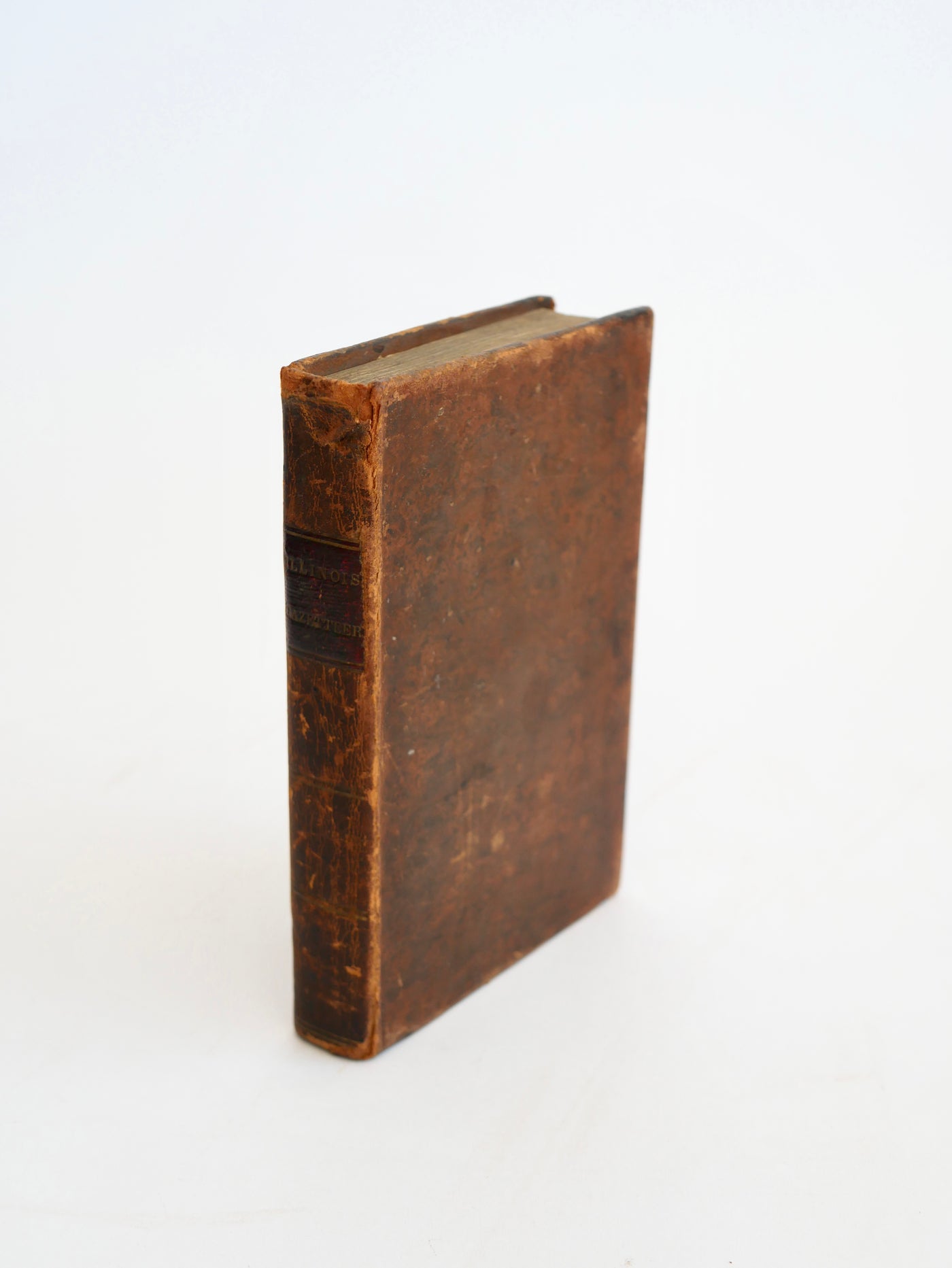 A cornerstone of Illinois frontier Americana — the first edition, in period tree calf, with a contemporary owner's signature of 1834