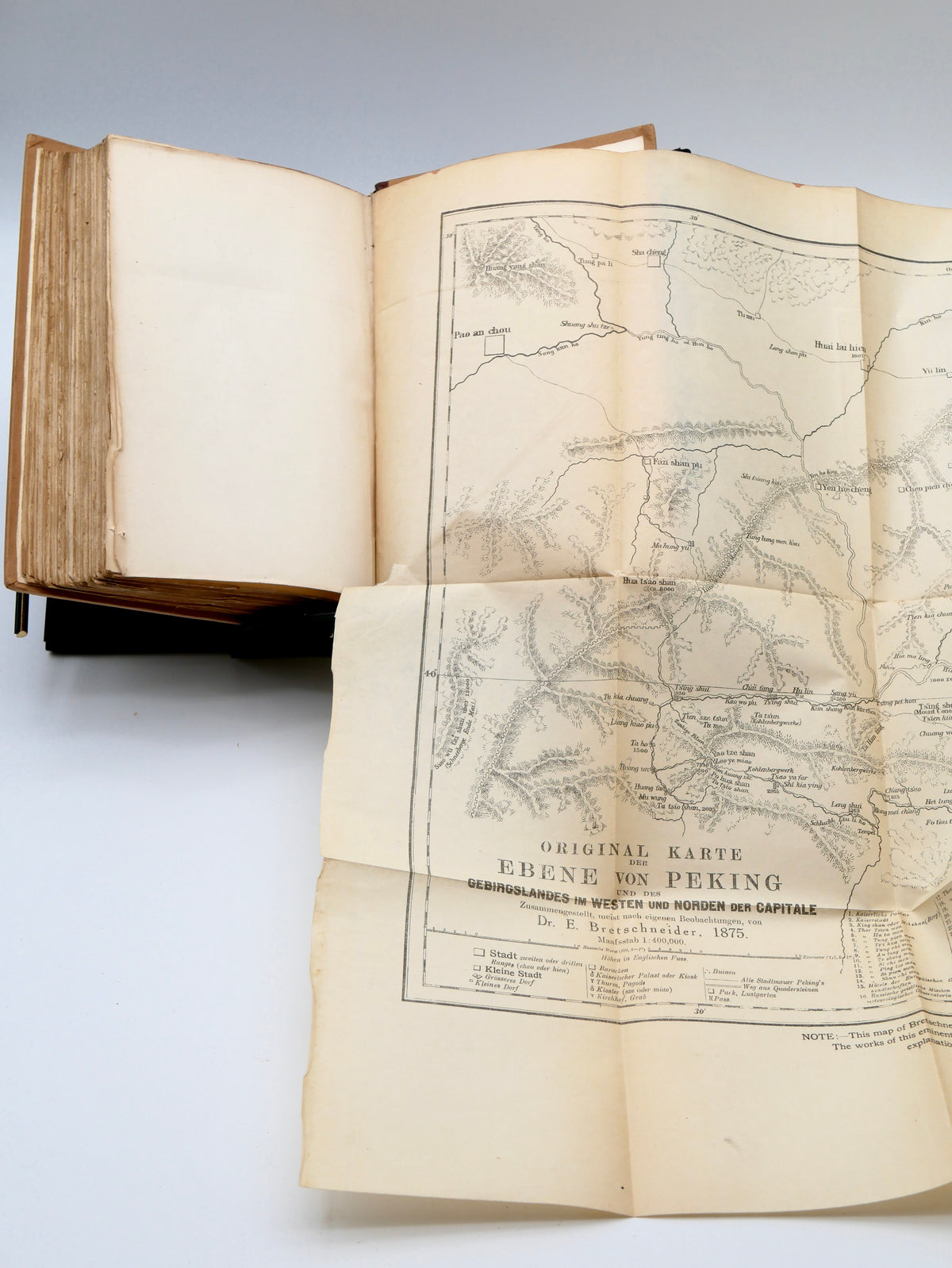 The great intimate guide to old Peking — an insider's portrait of the imperial city, in the first edition with five folding maps