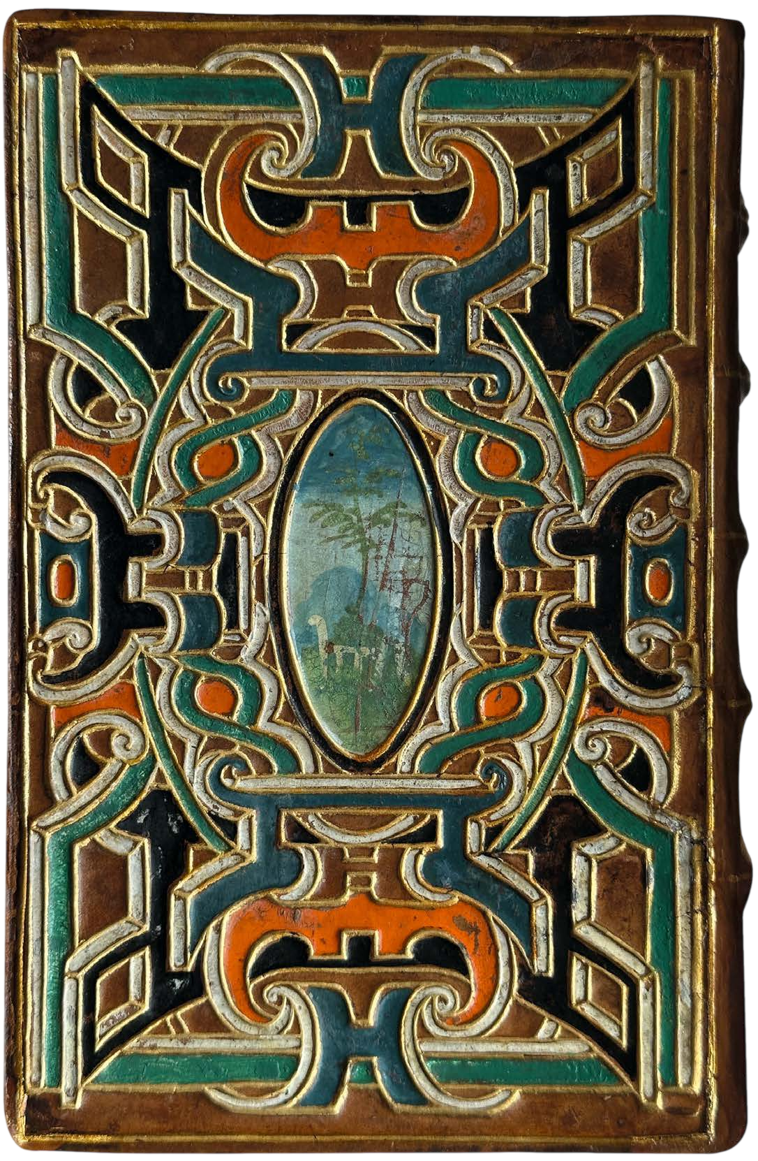 Decorative object with intricate patterns and a central oval inset