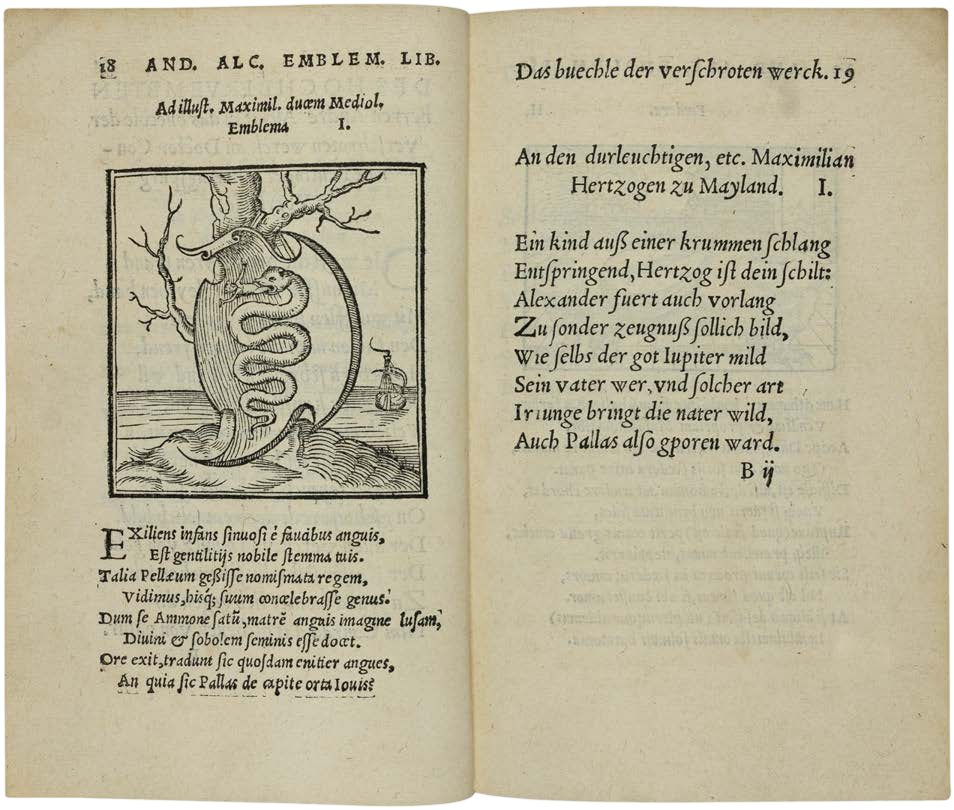 Open book with text and an illustration of a snake on a branch