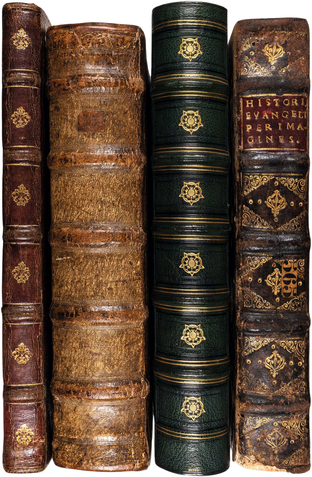 Four old books with decorative spines on a white background