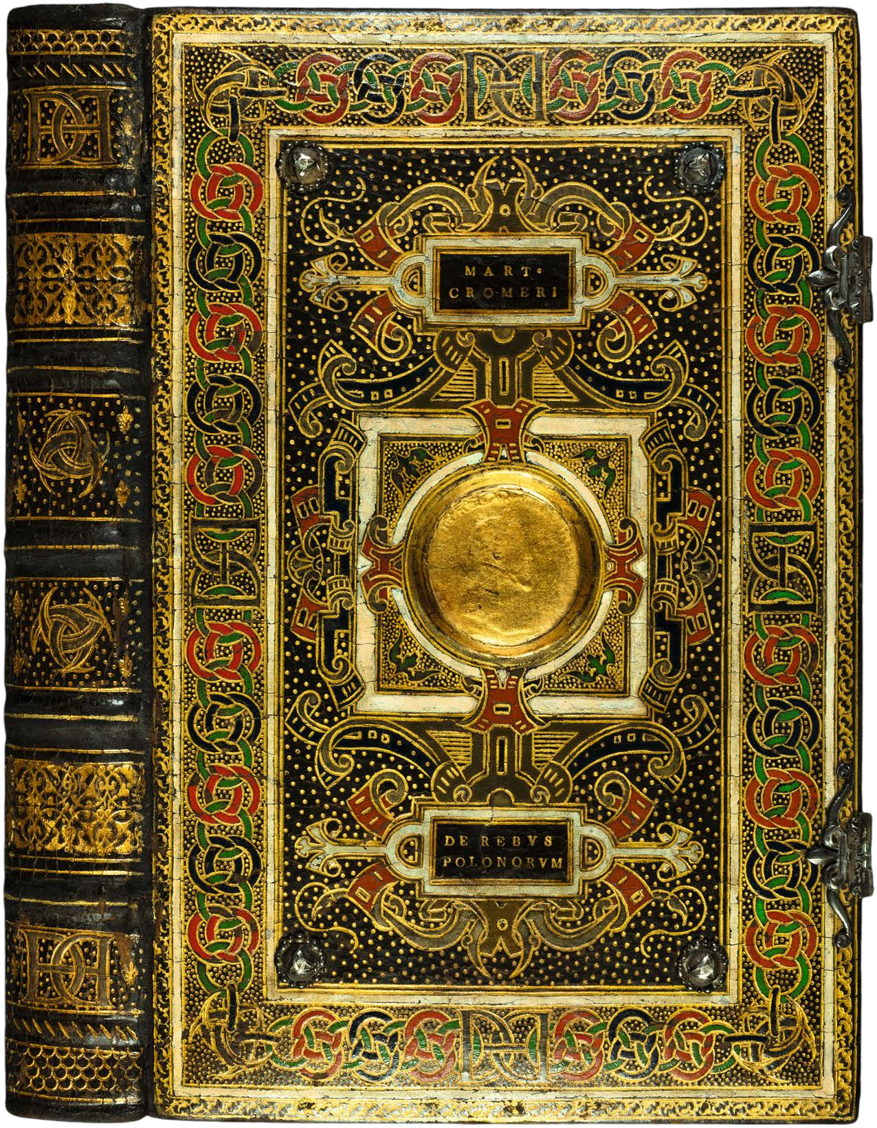Decorative book cover with gold and black design