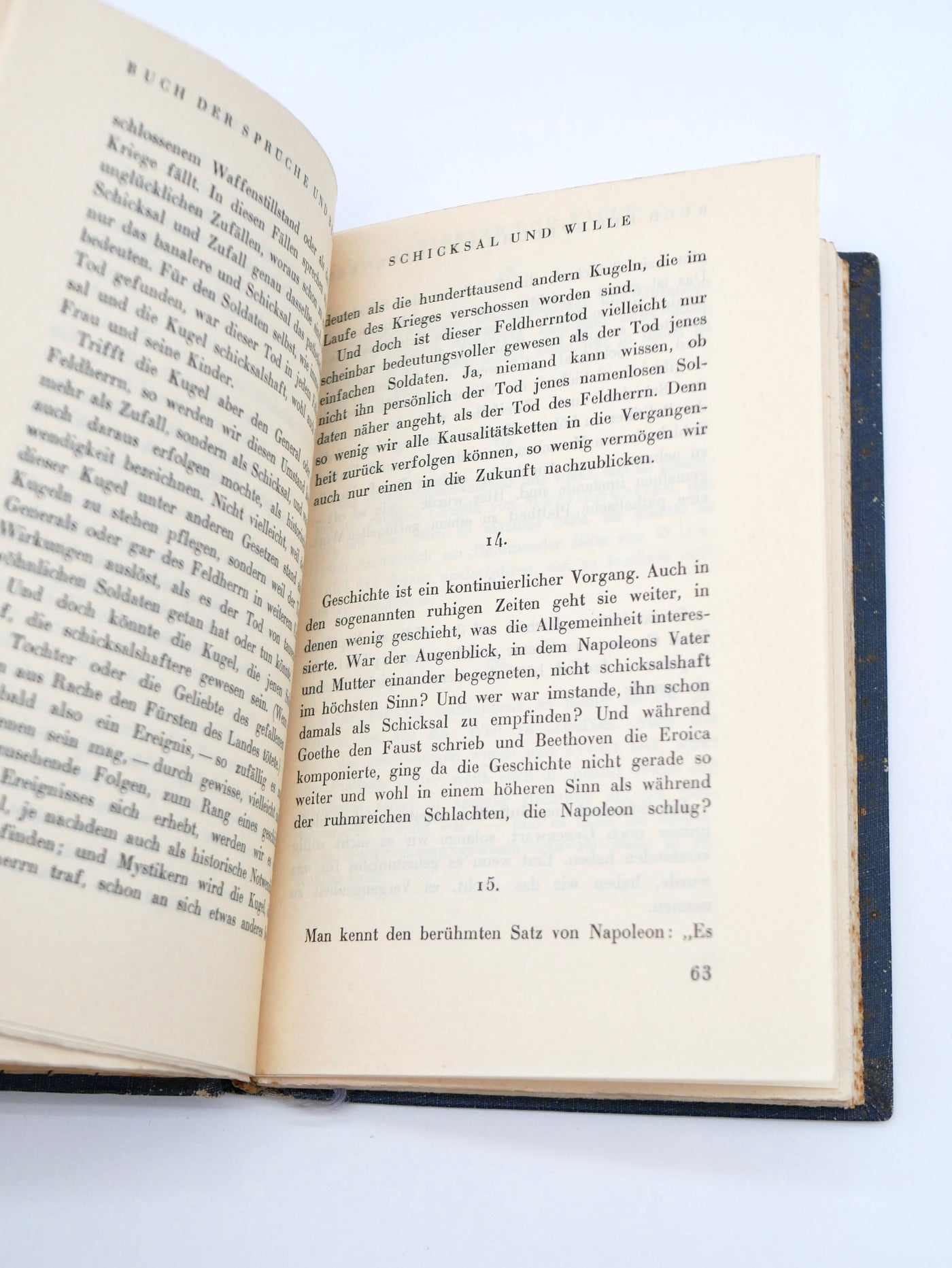 Open book with text on a white background
