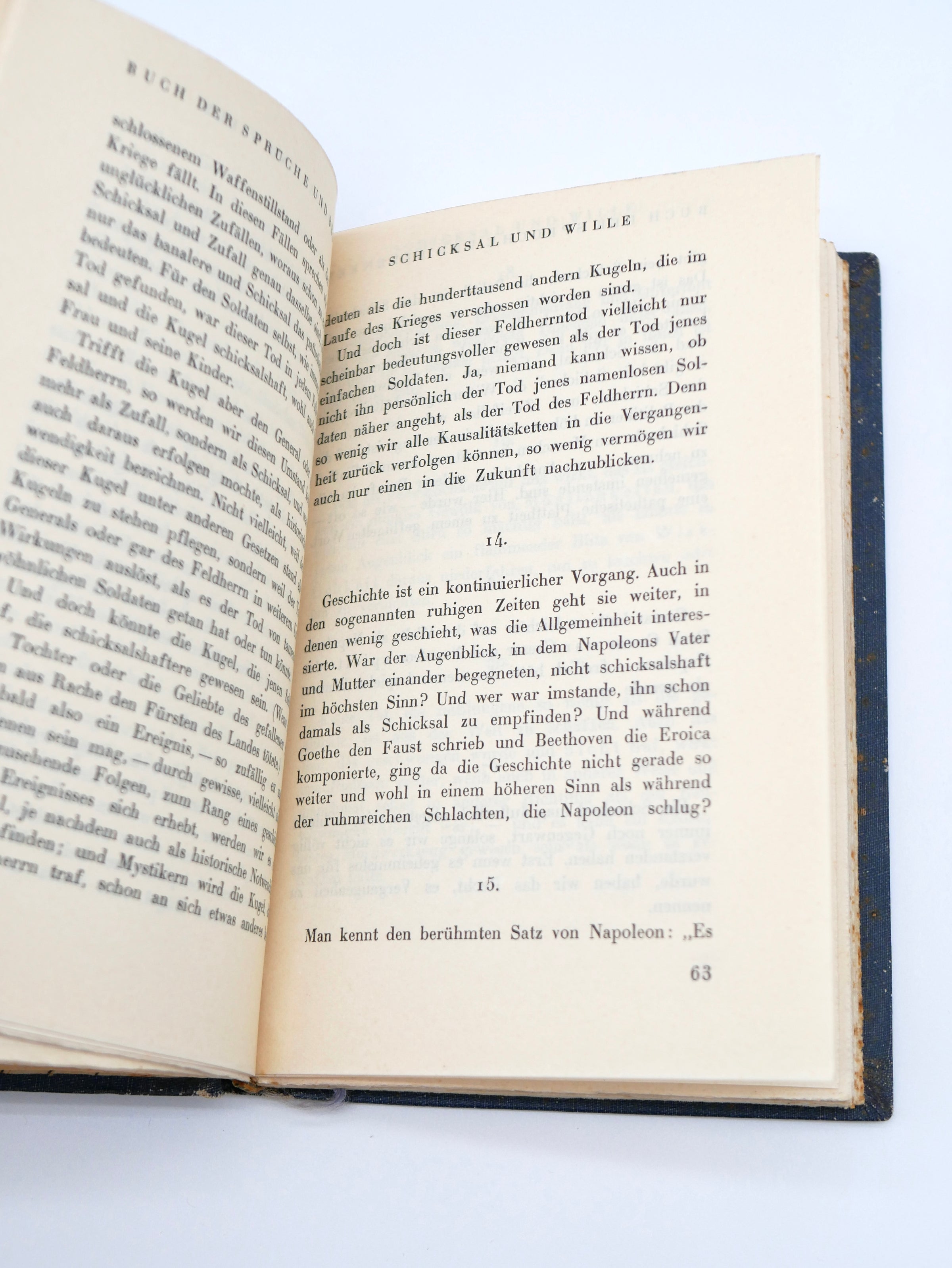 Open book with text on a white background