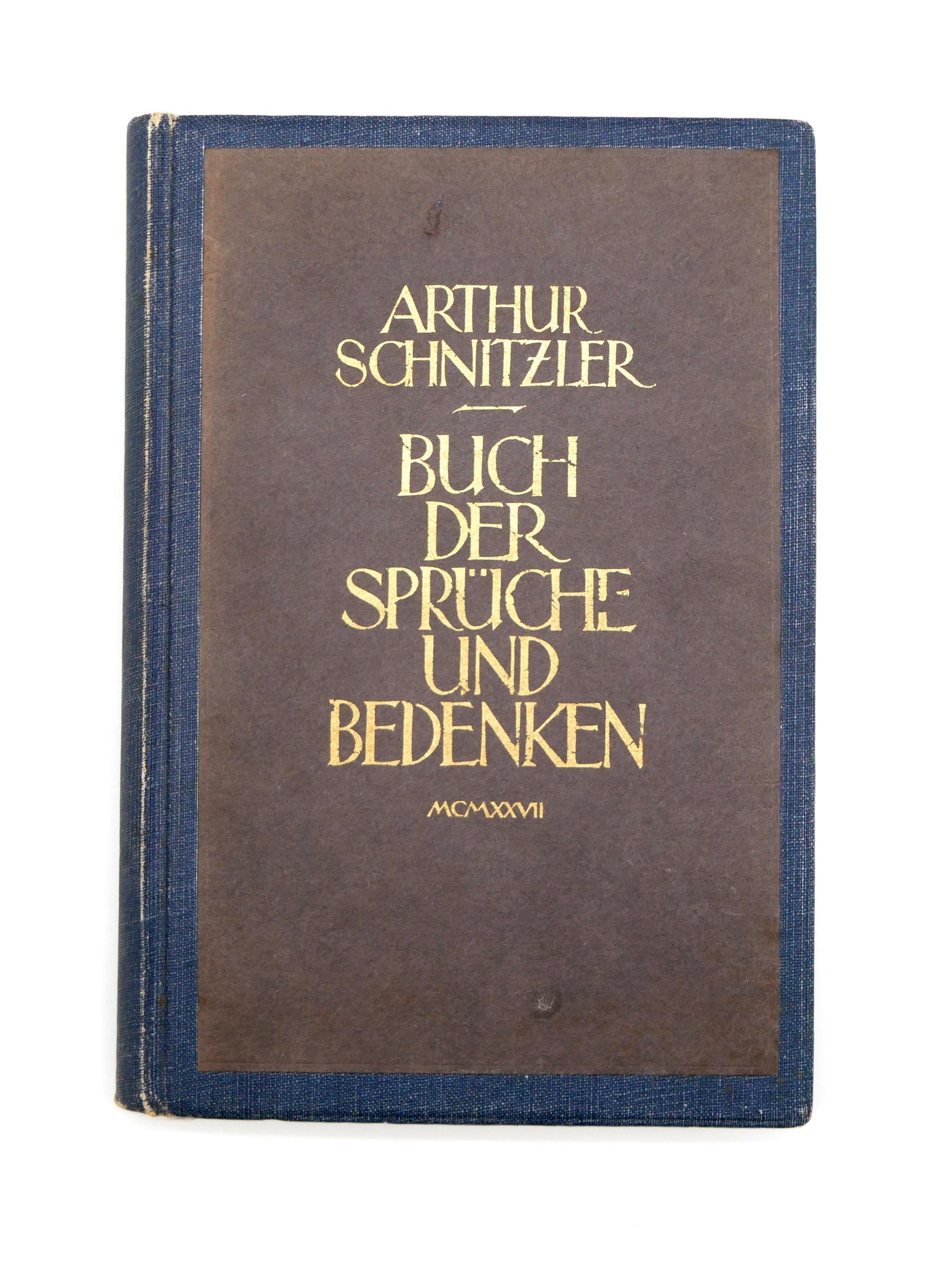 Book titled 'Buch der Sprüche und Bedenken' by Arthur Schnitzler on a white background