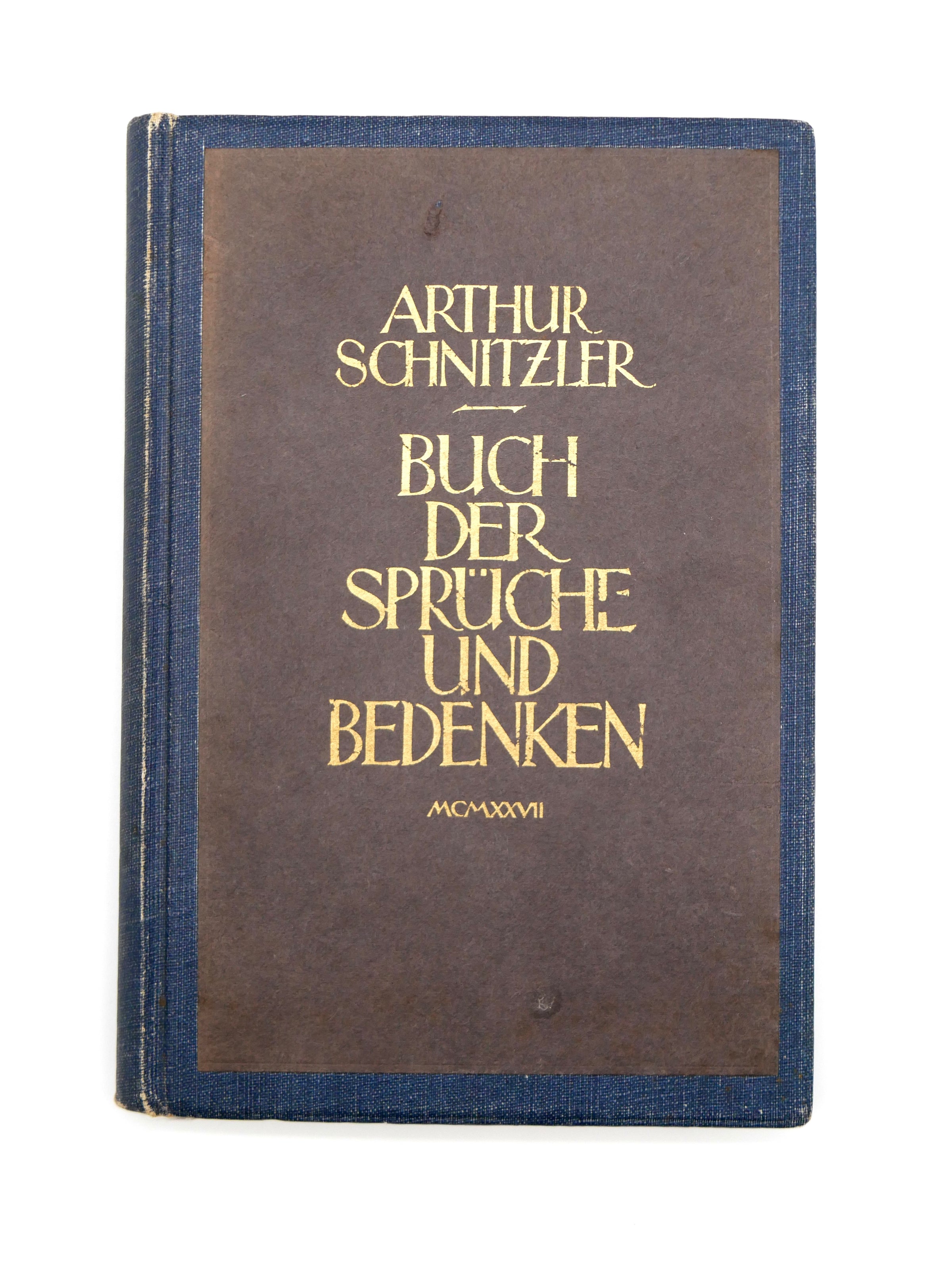 Book titled 'Buch der Sprüche und Bedenken' by Arthur Schnitzler on a white background