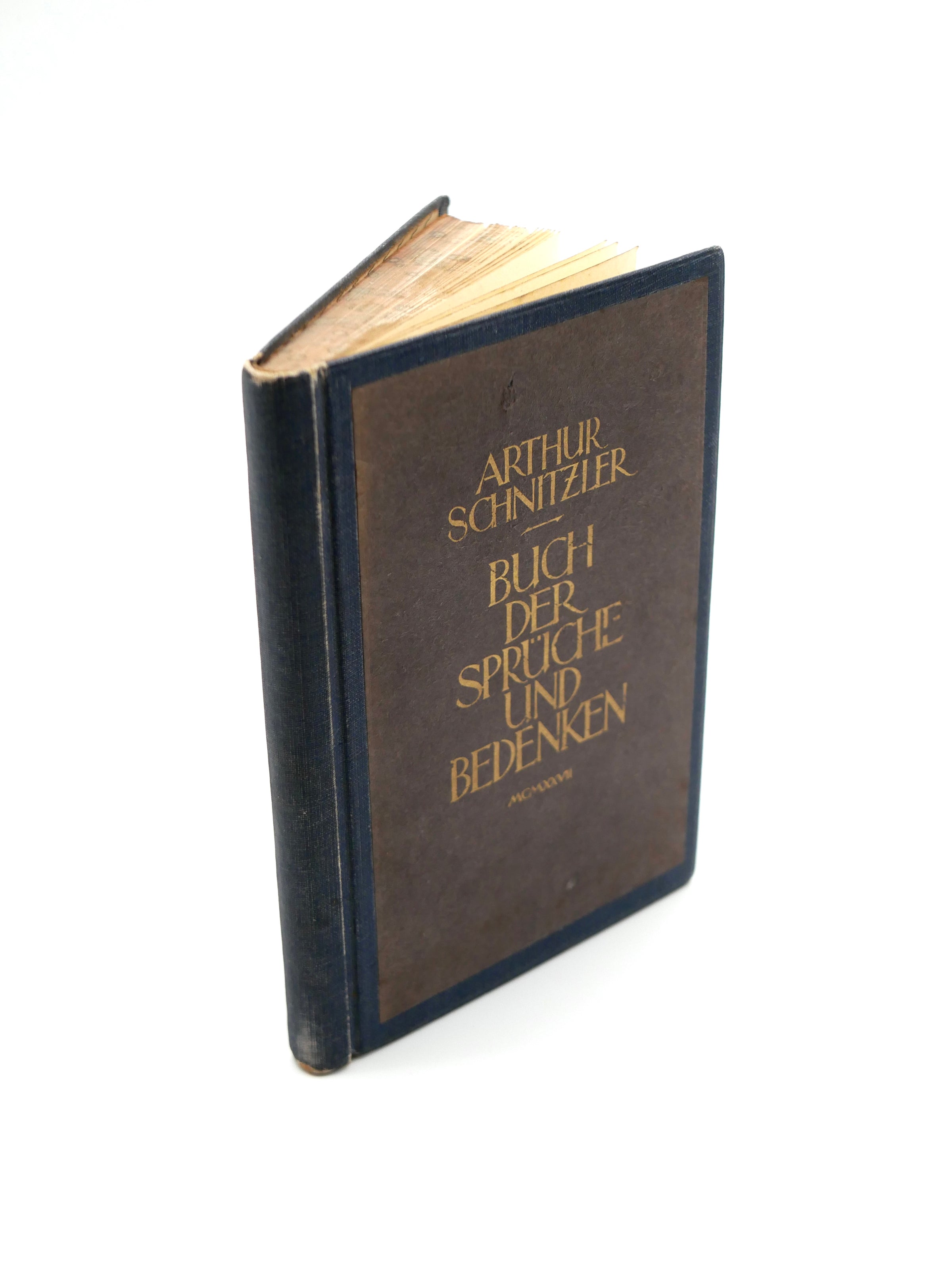 Book titled 'Buch der Sprüche und Bedenken' by Arthur Schnitzler on a white background