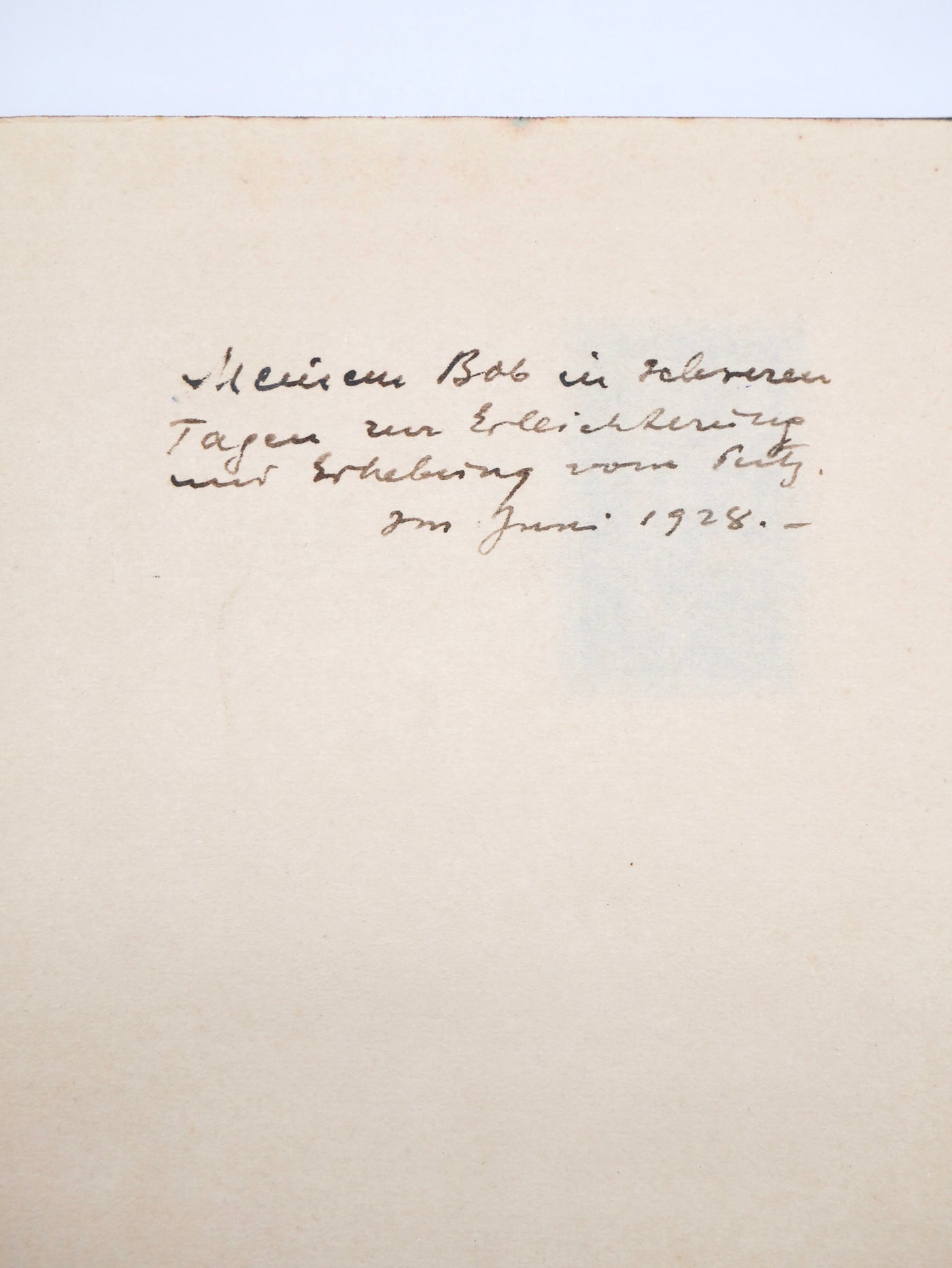 Handwritten text on a beige background