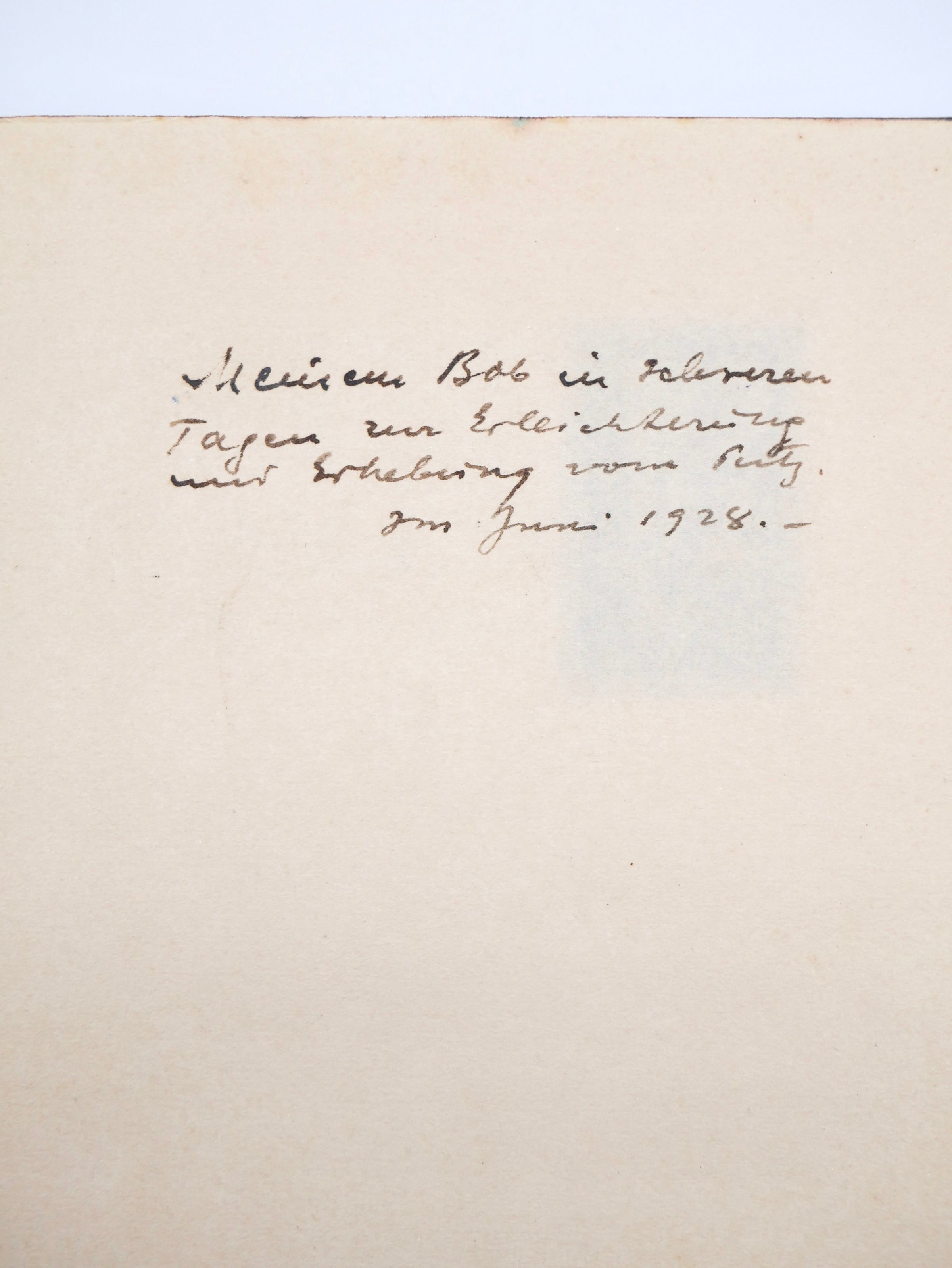 Handwritten text on a beige background